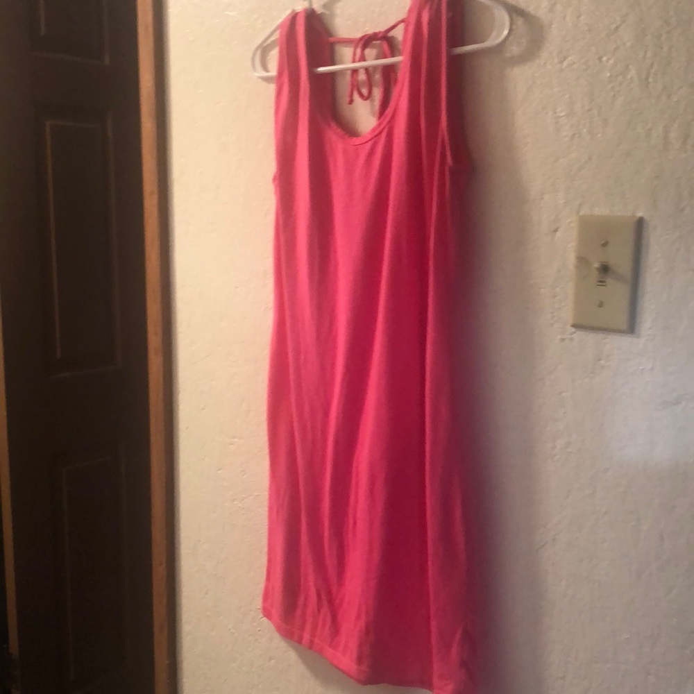 Hot pink,Sleeveless dress. Cutout back with tie